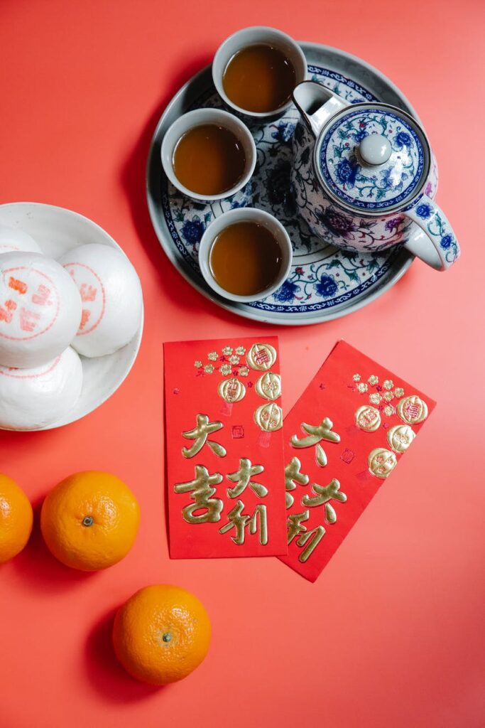 snacks and red envelopes on a red background
