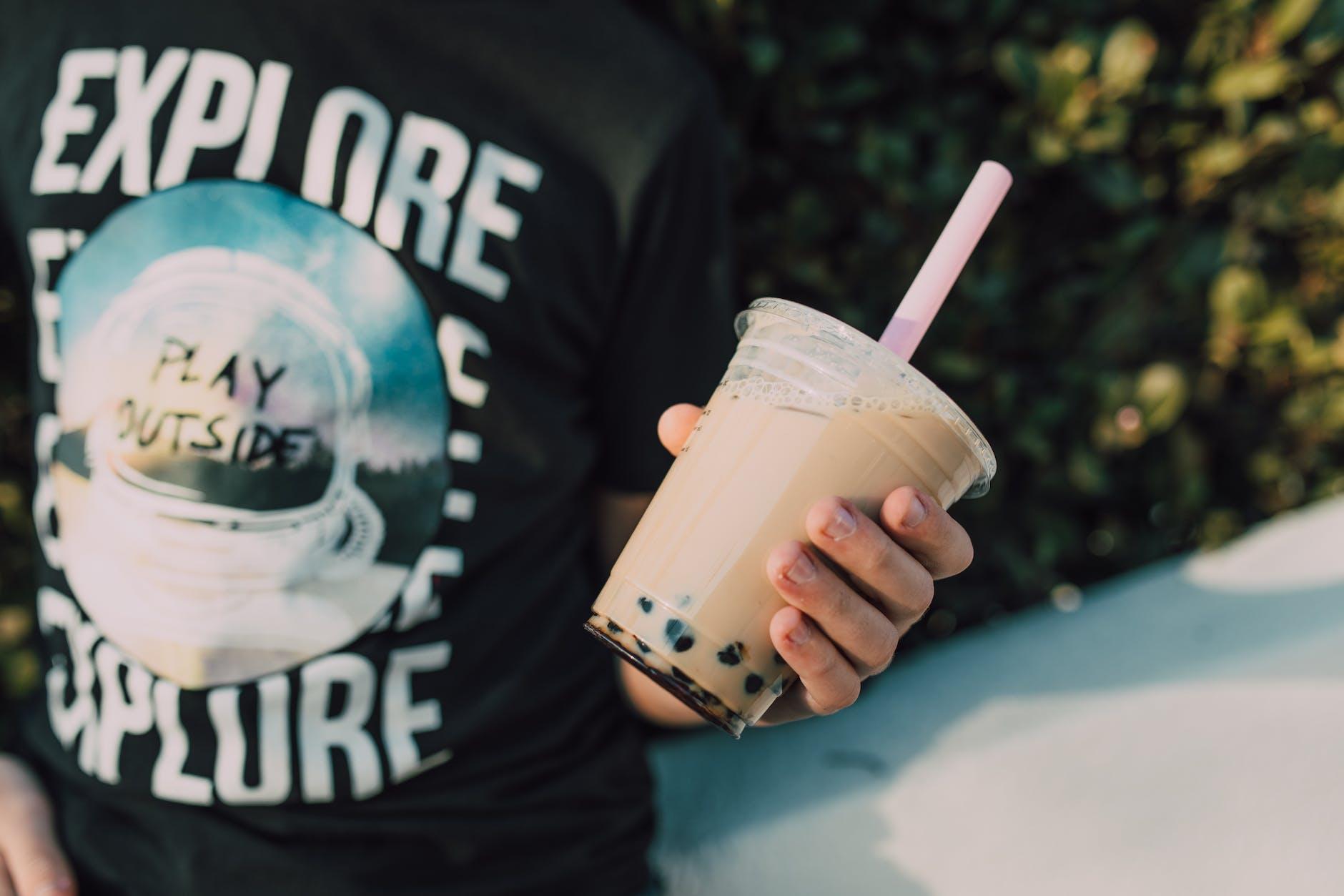 person holding a bubble tea Photo by RODNAE Productions on Pexels.com